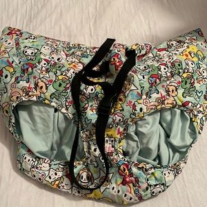 Tokidoki x Bebe Au Lait shopping cart cover in Unicorno 2.0